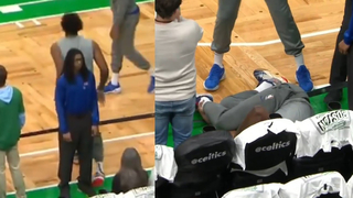 Joel Embiid Rolls Ankle on Security and Crashes into Front Row During Pregame Warmups